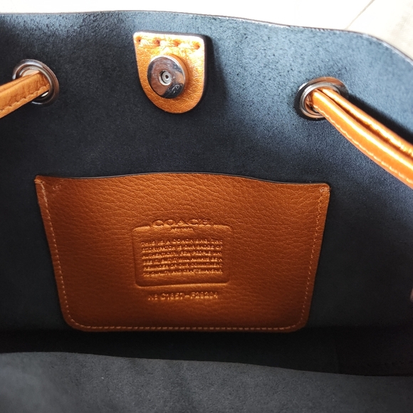 Coach Metallic Orange Leather Drawstring Crossbody - Picture 12 of 15